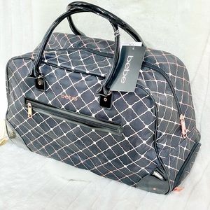 New with tag BEBE GISELLE ROLLING DUFFEL with recessed wheels & internal handle